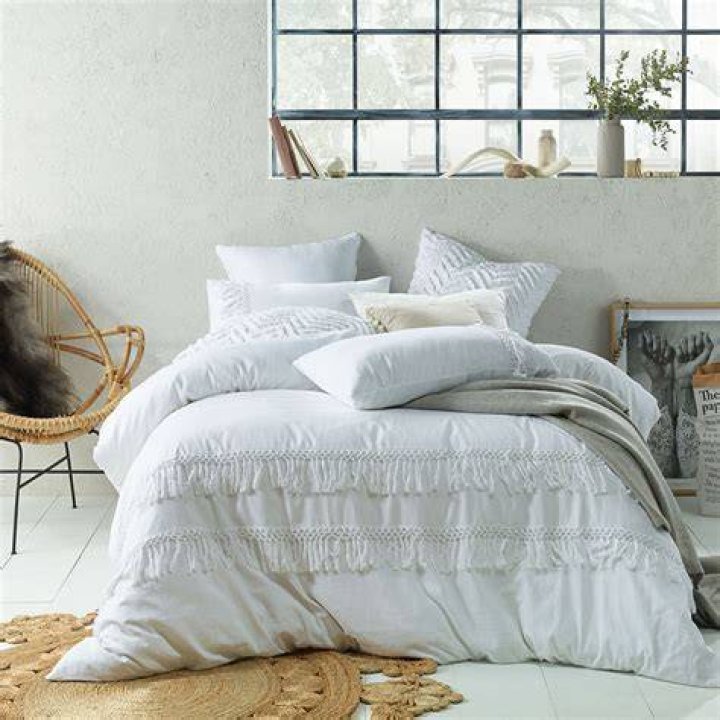 How do you accessorize a white bedroom