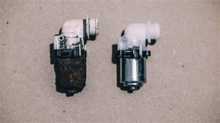 How do you change a windshield washer pump on a Honda Civic