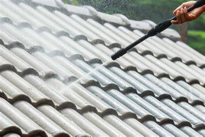 How do you clean a pressure washer roof