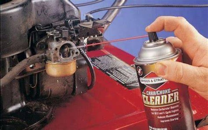 How do you clean the carburetor on a push mower