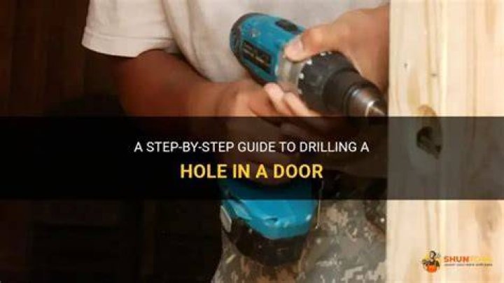 How do you drill a hole in a garage door