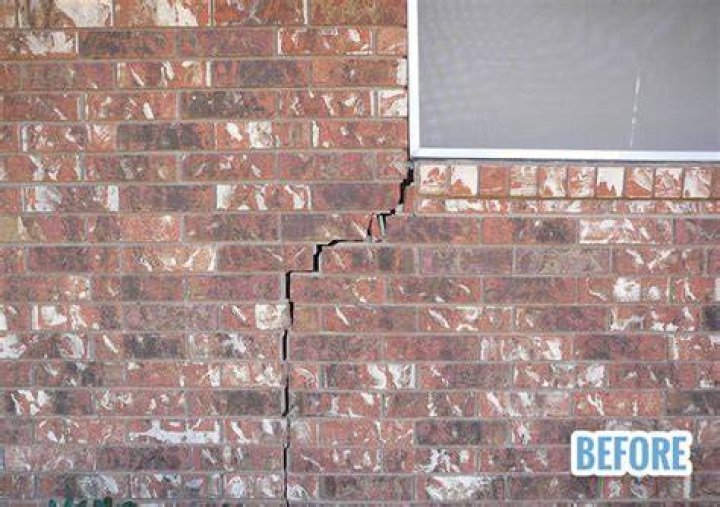 How do you fix cracks in brick foundation