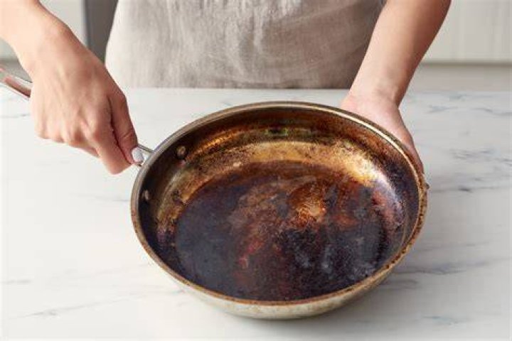 How do you get burnt food off a pan without baking soda