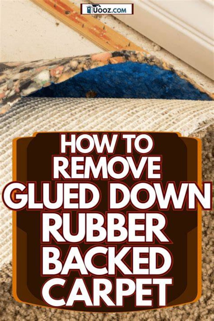 How do you remove glued down rubber backed carpet