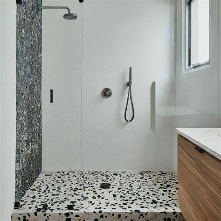 How do you resurface a terrazzo shower base