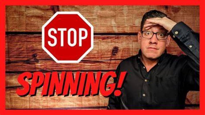How do you stop spinning