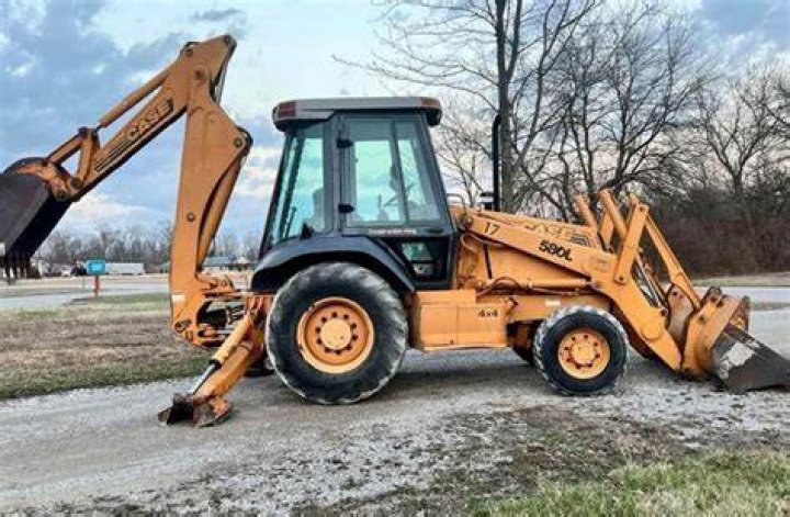 How much does a Case 580l backhoe weigh