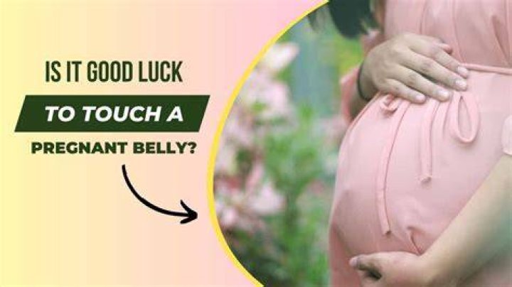 Is rubbing a pregnant belly good luck