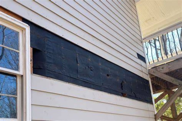 Is there wood under vinyl siding