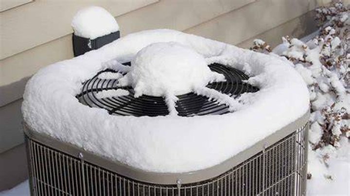 Should a central air conditioner be covered in the winter