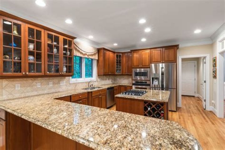 What color countertops go with brown cabinets