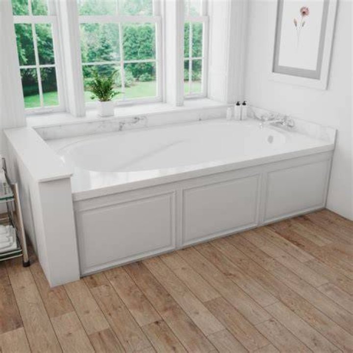 What is an alcove tub