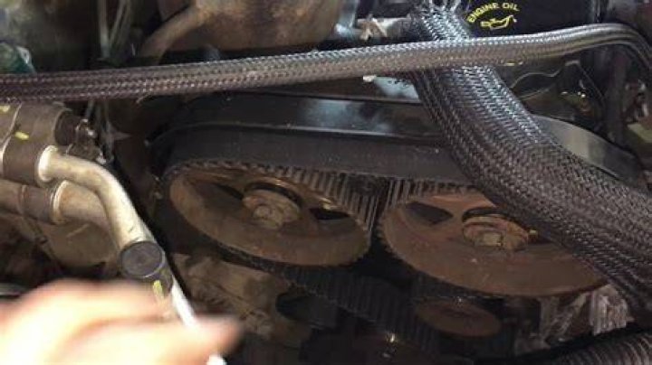 When should the timing belt be replaced on a PT Cruiser