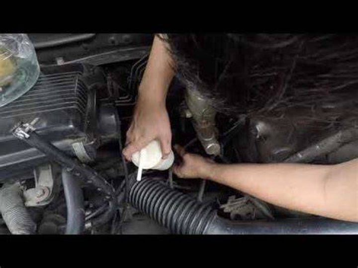 Where is the fuel filter located on a 2014 Nissan Sentra